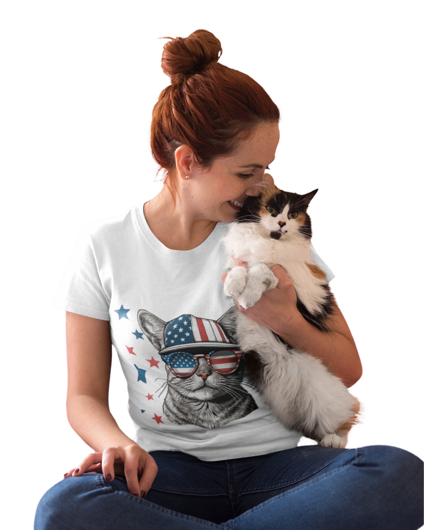 Woman holding a cat wearing a t-shirt with a graphic of a cat wearing an American flag hat.