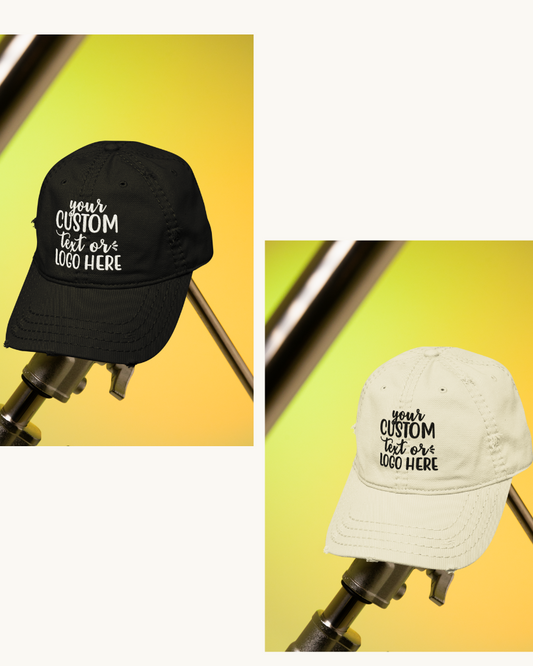 Black and white baseball caps with customizable text on a yellow background