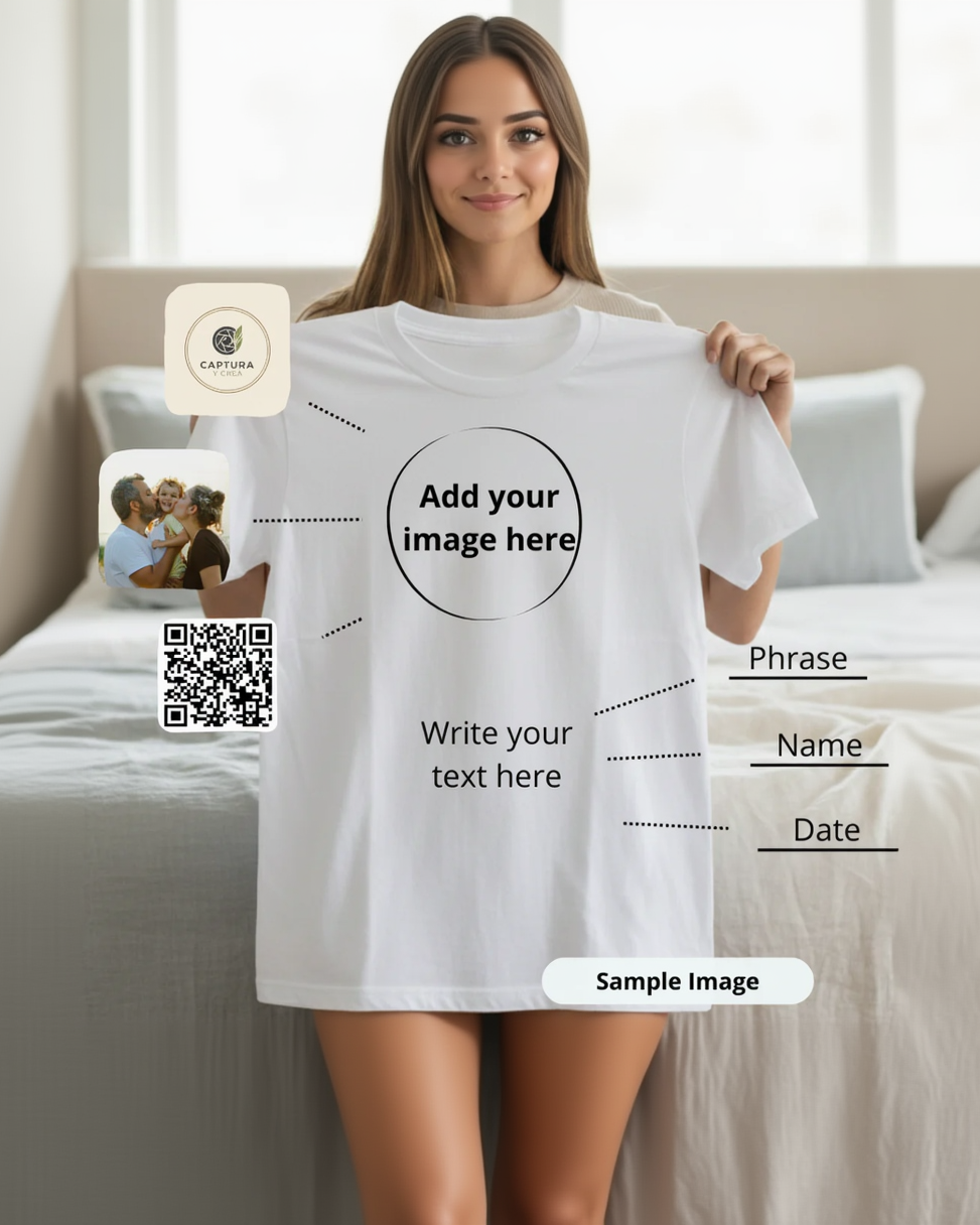 White t-shirt with personalizable text and image areas held by a person.
