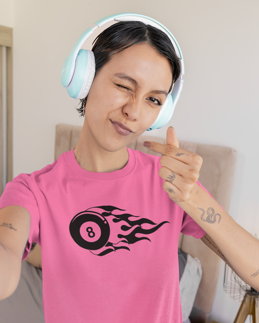 Person wearing a pink t-shirt with a black logo, giving a thumbs-up gesture.