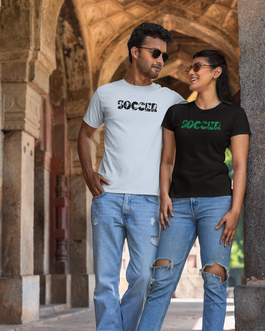 Two people wearing 'SOCCER' t-shirts standing in an archway.
