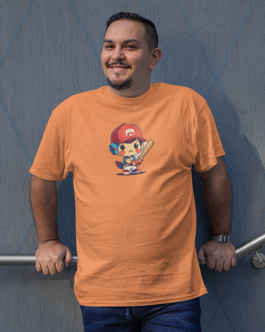 Man wearing an orange t-shirt with a graphic design, standing against a blue wall.