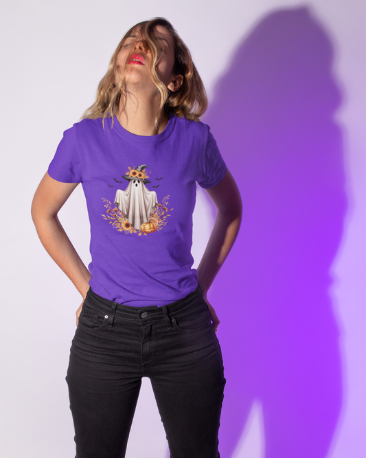 Person wearing a purple t-shirt with a graphic design against a white background